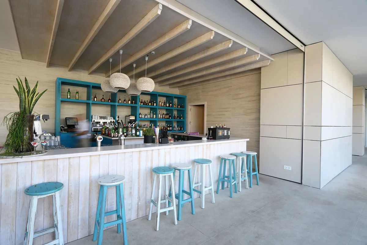 Inside image of a café with so many chairs